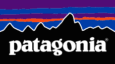 Patagonia logo featuring stylized mountain peaks with purple and red horizontal stripes above the brand name on a black background.